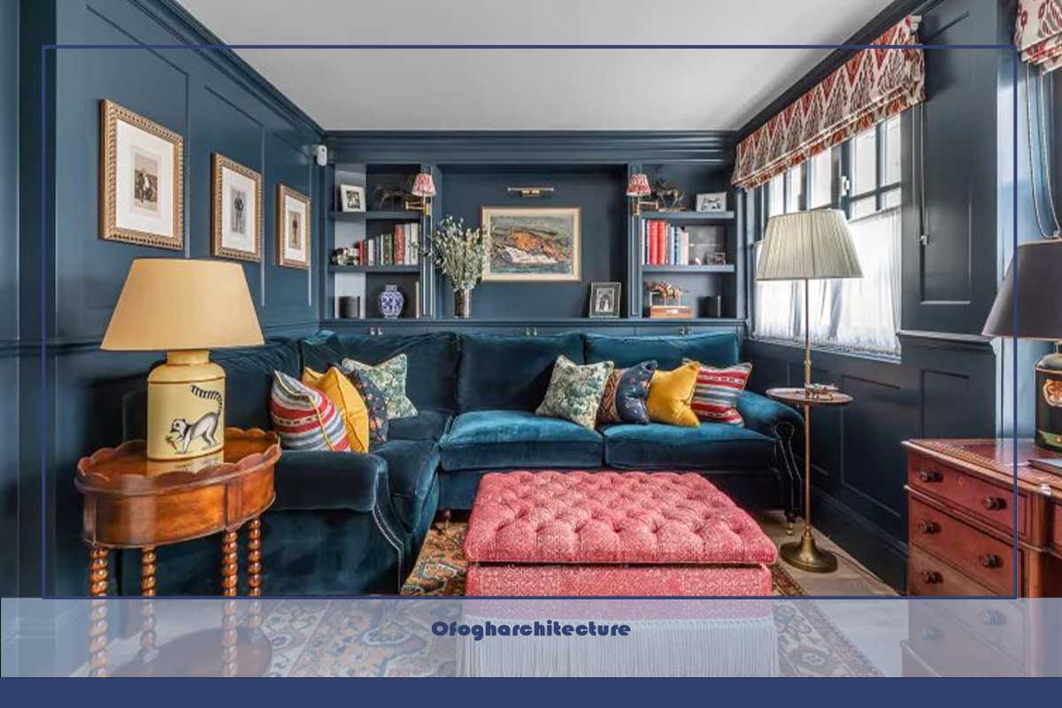 اتاق نشیمن آبی بارلو و بارلو با آثار هنری، مبل آبی و زیرپایی صورتی